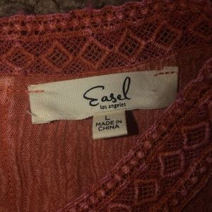 Orange dress with designs at the top